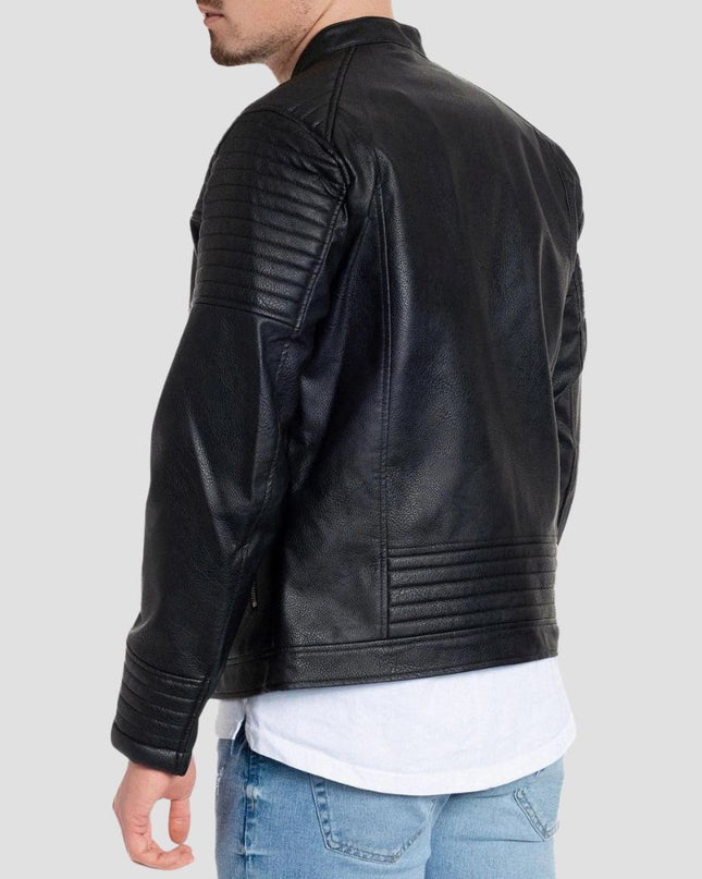Black leather jacket worn by a person on a light gray background