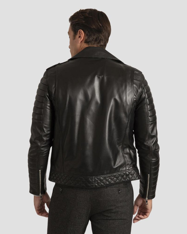 Man wearing a black leather jacket on a light gray background