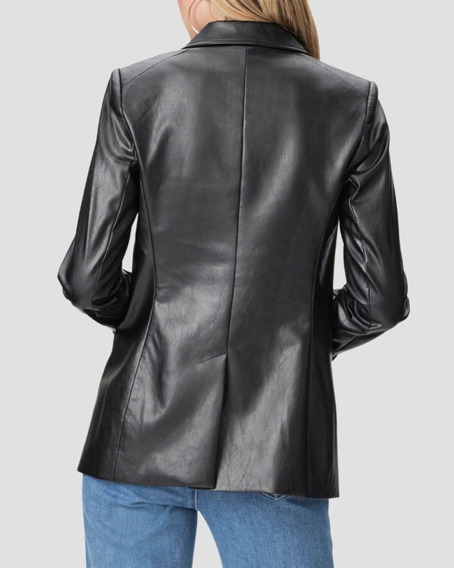 Black leather jacket worn by a person on a light gray background
