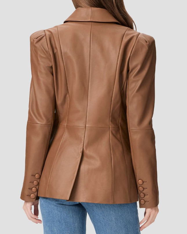 Brown leather jacket worn by a person on a light gray background