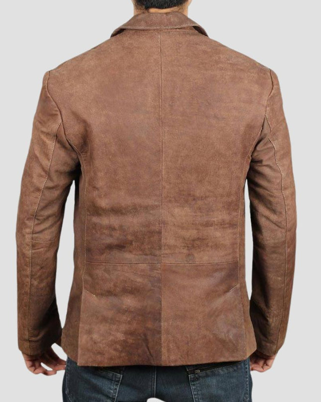 Brown leather jacket worn by a person on a light gray background