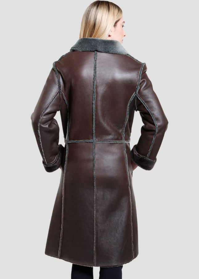 Brown leather coat worn by a person on a light gray background