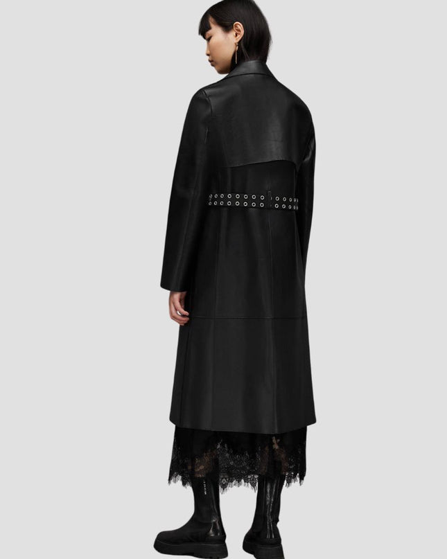Black coat with lace details on a plain background