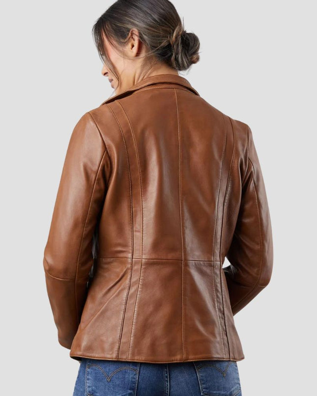 Person wearing a brown leather jacket on a light gray background
