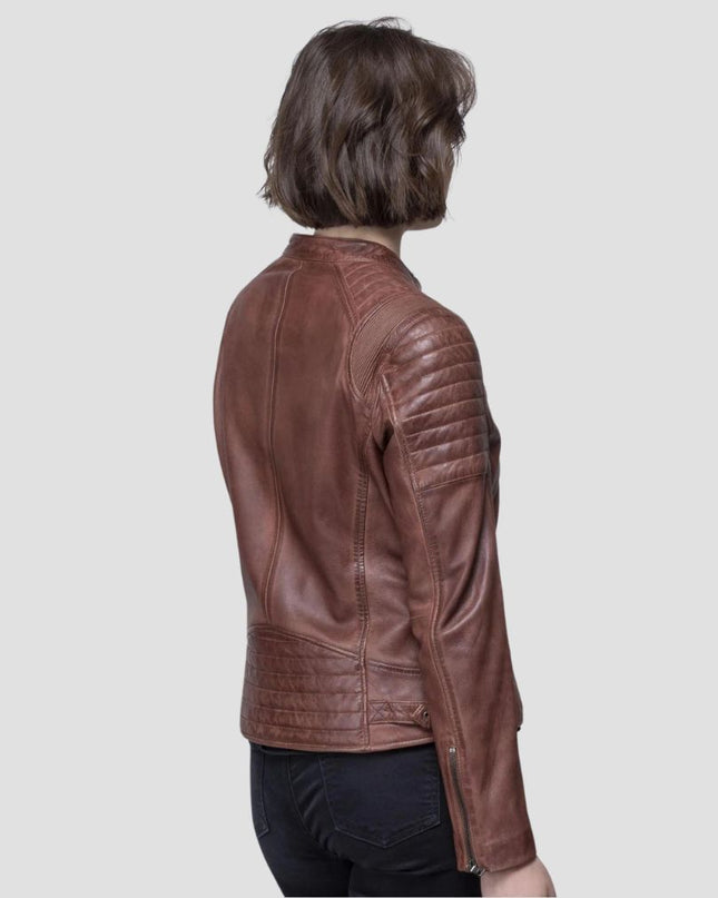 Brown leather jacket worn by a person on a light gray background