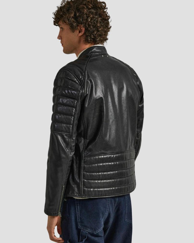 Man wearing a black leather jacket on a light gray background