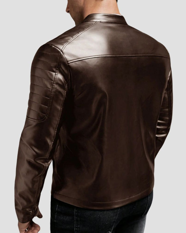 Brown leather jacket worn by a person on a light gray background