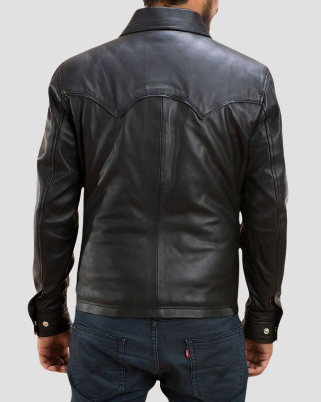 Black leather jacket worn by a person on a light gray background