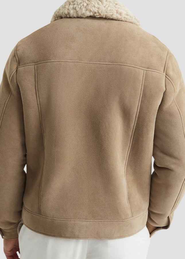Beige jacket with shearling collar on a white background