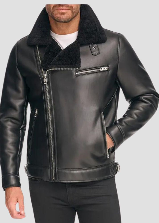 Black leather jacket with fur collar on a gray background