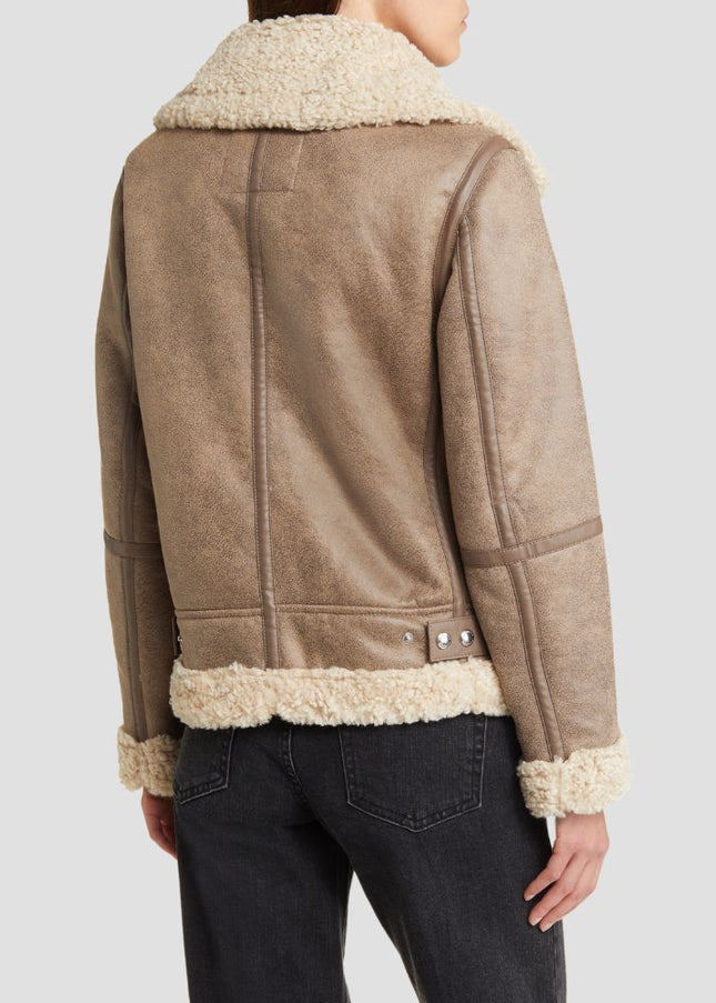 Brown leather jacket with white fur lining on a plain background