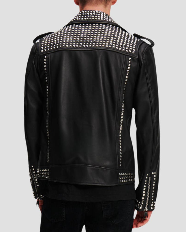 Black leather jacket with silver studs on a gray background