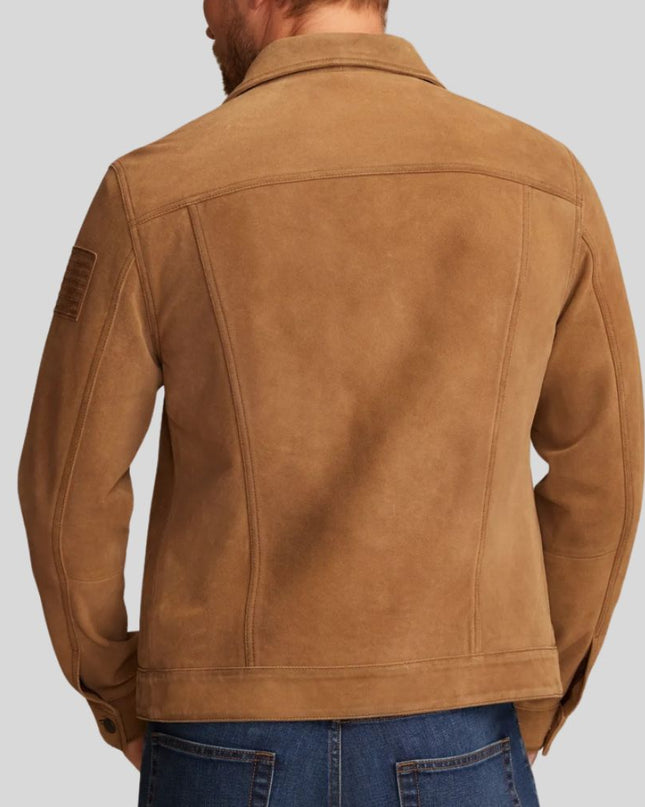 Brown leather jacket worn by a person on a light gray background