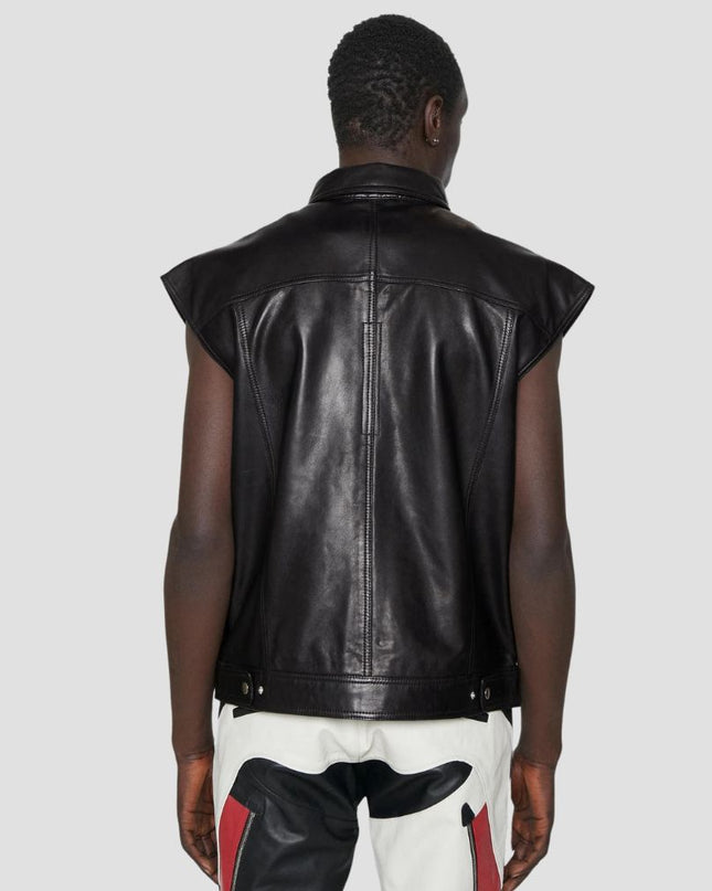Person wearing a black leather vest on a white background