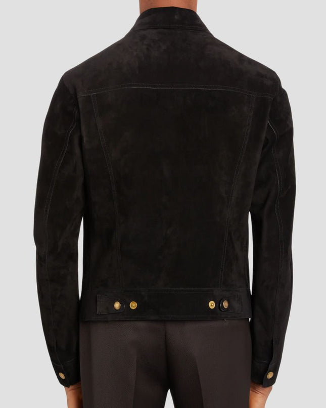 Black suede jacket with gold buttons on a gray background