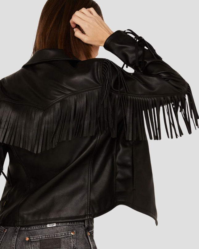 Black leather jacket with fringe details on a plain background