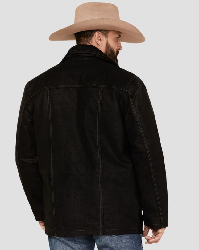 Man wearing a black leather jacket and beige cowboy hat on a light gray background