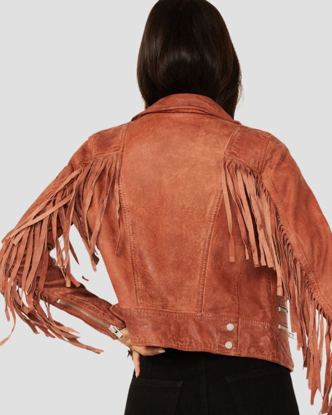 Brown suede jacket with fringes on a plain background