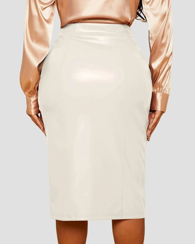 Beige pencil skirt worn with a bronze long-sleeve top on a plain background